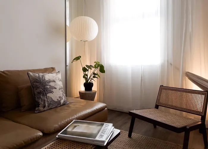 Tranquil Oasis W 100Inch Cinema & Hammock, By The Design Traveller